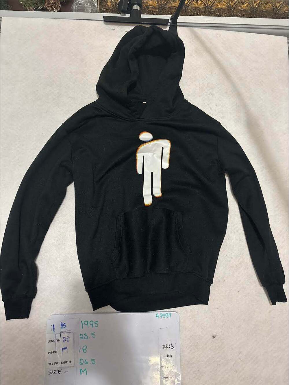 Black Hoodie with White Graphic Figure, Size Medium